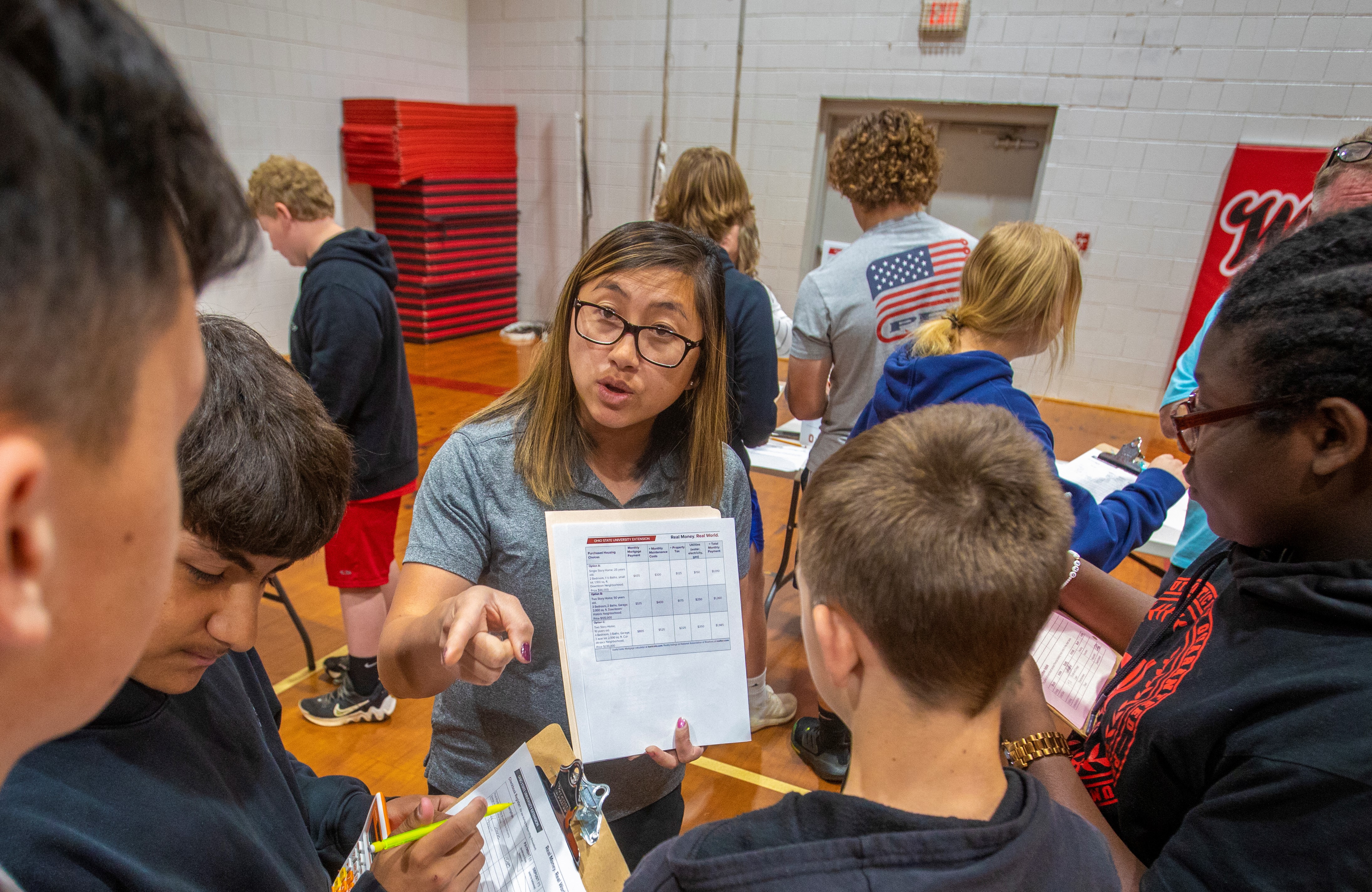 image of Der Holcomb, Family and Consumer Science Agent, instructing students through the Real Money. Real World. simulation