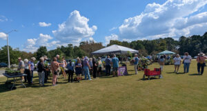 Customers lining up at the Growing Wild Nursery booth.